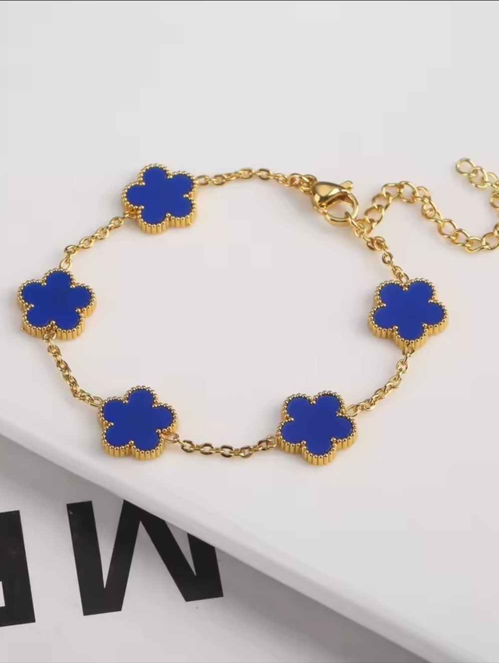 Gold Plated Bracelet with Blue Clover Charms